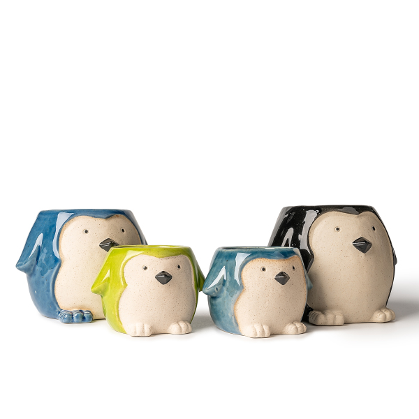 Suporturi de lumânări din ceramică în formă de pinguin: artă de lumină și umbră adorabile și confortabile